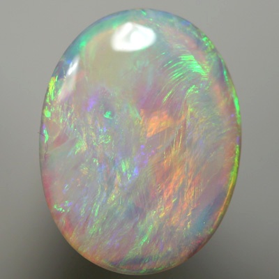SOLID SEMI BLACK OPAL Orange moves with green with a touch of purple between these colours